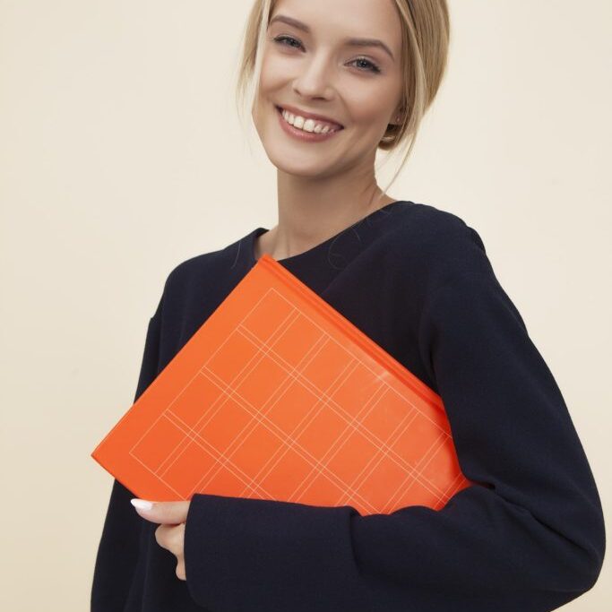 smiling-woman-wearing-black-sweater-1587009